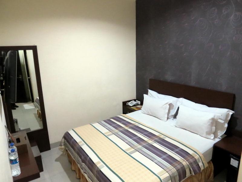 Vindhika Hotel Makassar Rom bilde